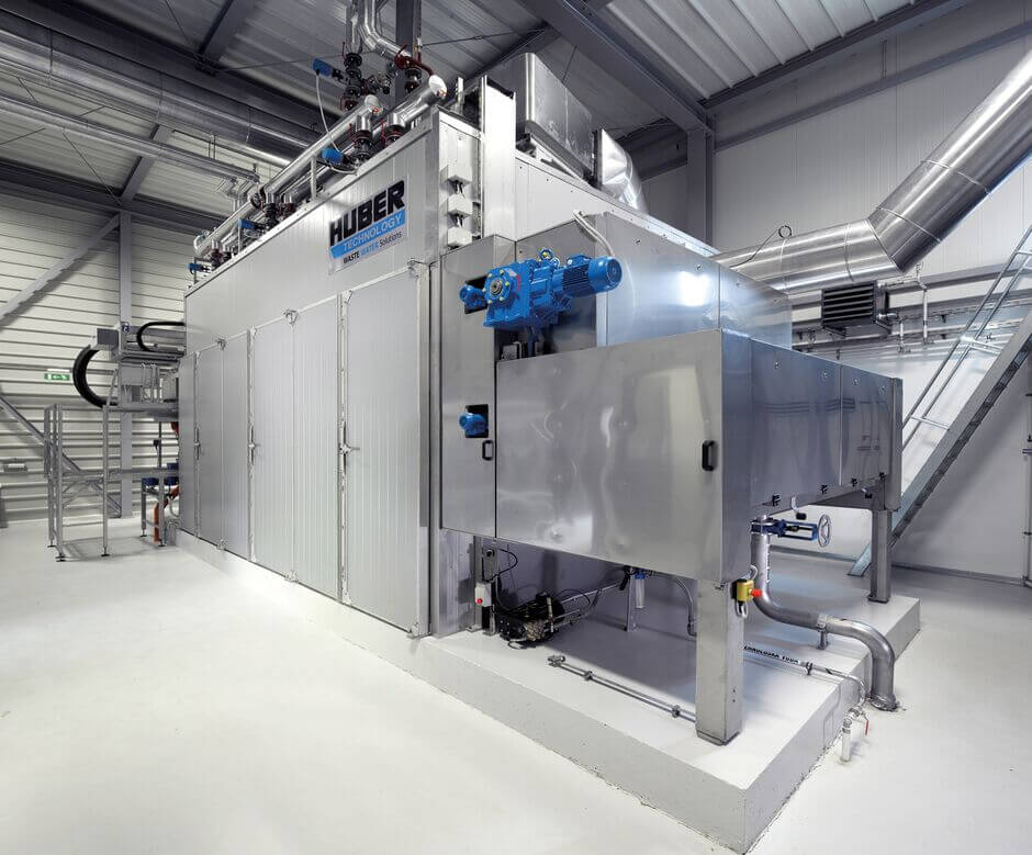 Head piece with integrated automatic belt cleaning Head piece with integrated automatic belt cleaning