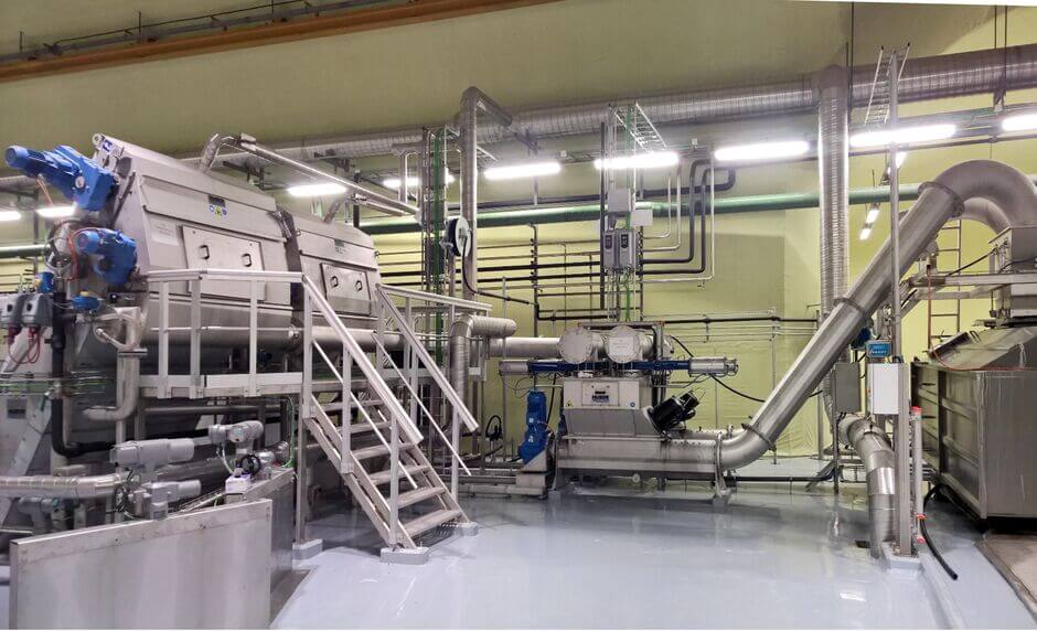 Mechanical treatment with HUBER screens and Screenings Wash Presses WAP® SL being fed by launder channels Mechanical treatment with HUBER screens and Screenings Wash Presses WAP® SL being fed by launder channels