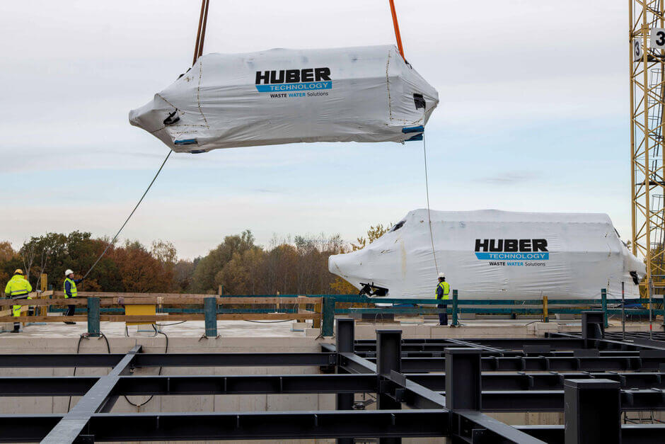 A disc dryer is lifted into place with the help of a heavy-duty crane A disc dryer is lifted into place with the help of a heavy-duty crane