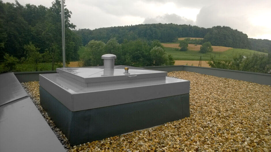 HUBER manhole cover SD1 with crown cover on flat roof HUBER manhole cover SD1 with crown cover on flat roof