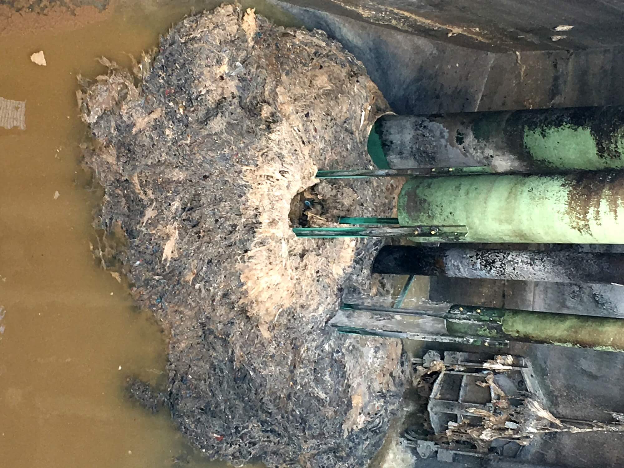 Screenings build up in balance tank – before screens were fitted Screenings build up in balance tank – before screens were fitted