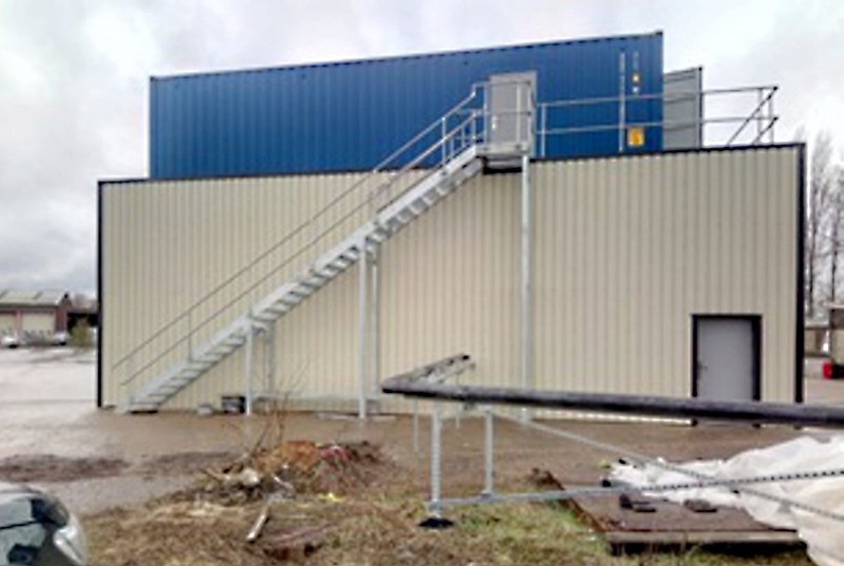 Figure 2 - Containerised screw press installed above sheltered trailer Figure 2 - Containerised screw press installed above sheltered trailer