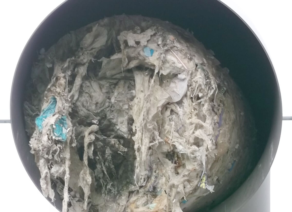 Washed and compacted screenings in the discharge pipe Washed and compacted screenings in the discharge pipe