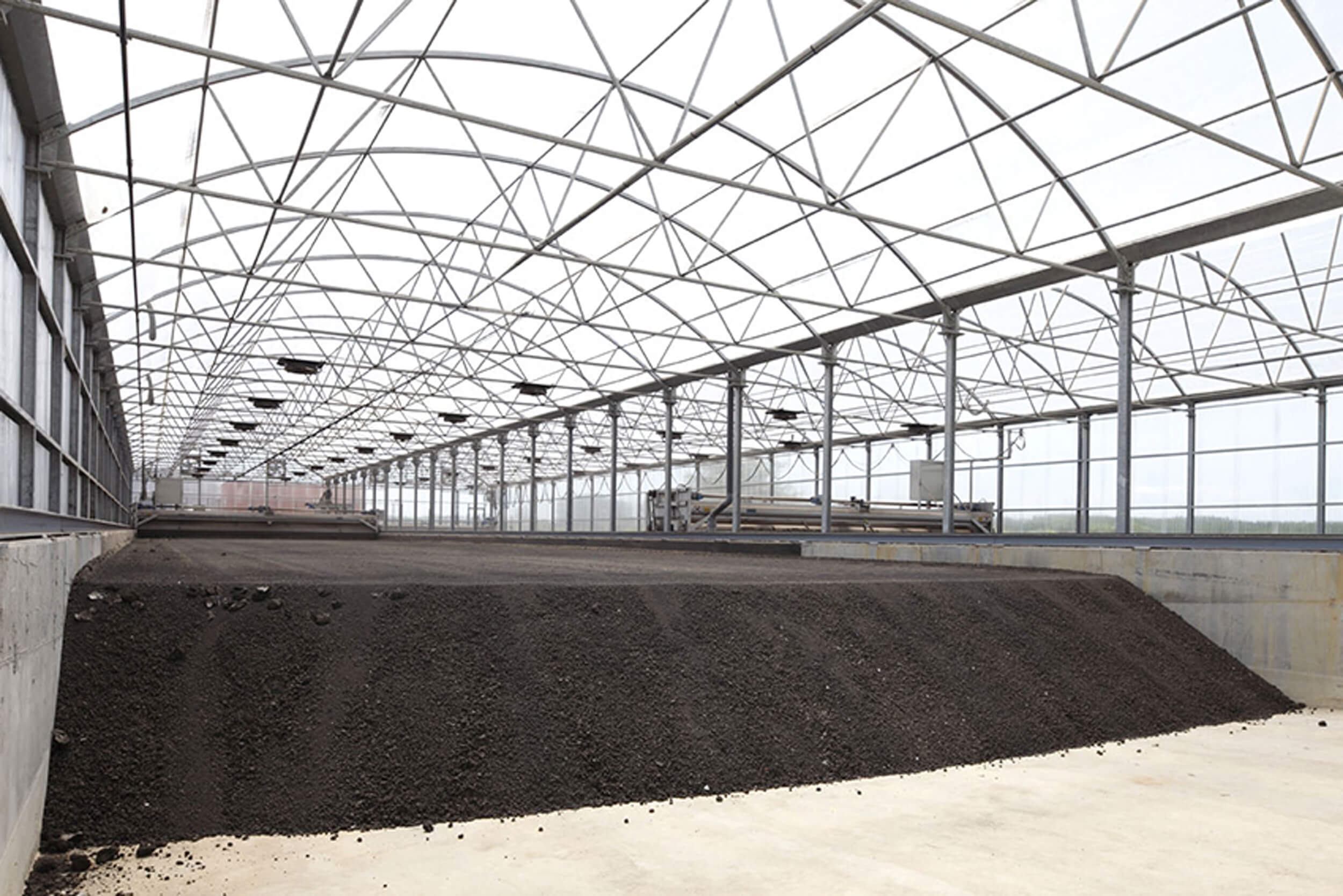 Dry sludge for removal by wheel loader and truck Dry sludge for removal by wheel loader and truck